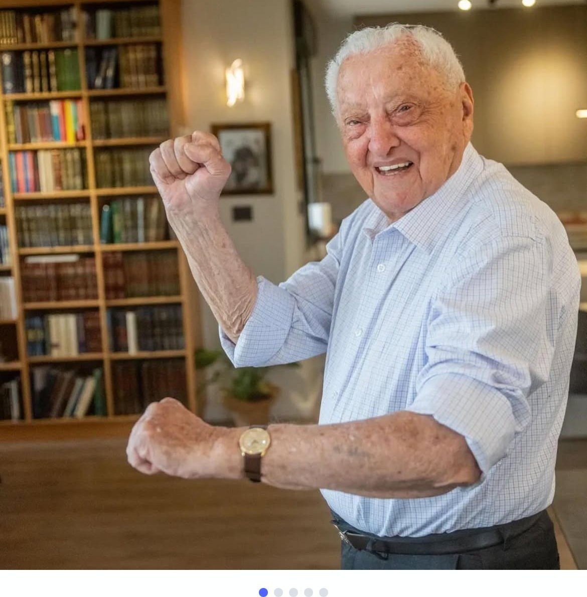 Papa in his Jerusalem apartment, fist raised
